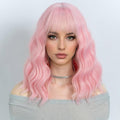 NOBLE Pink Wig Bob Wig with Bangs Short Loose Wavy Wigs for Women Shoulder Length Heat Resistant Synthetic Hair Bob Wavy Colored Wigs for Halloween Cosplay 12 Inches
